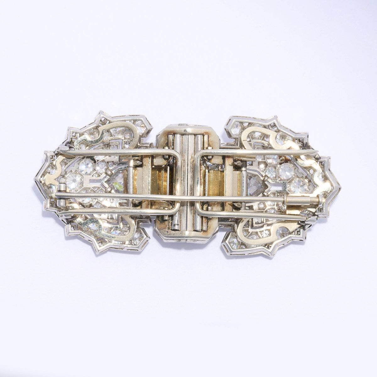 A diamond double clip brooch in platinum and white gold