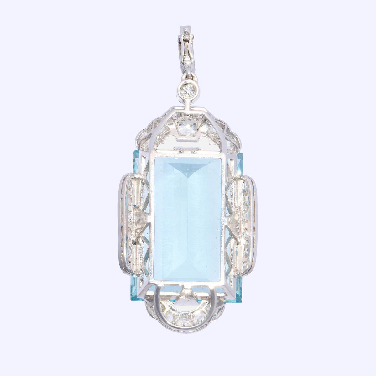 An Art Deco large rectangular aquamarine and diamond pendant in platinum