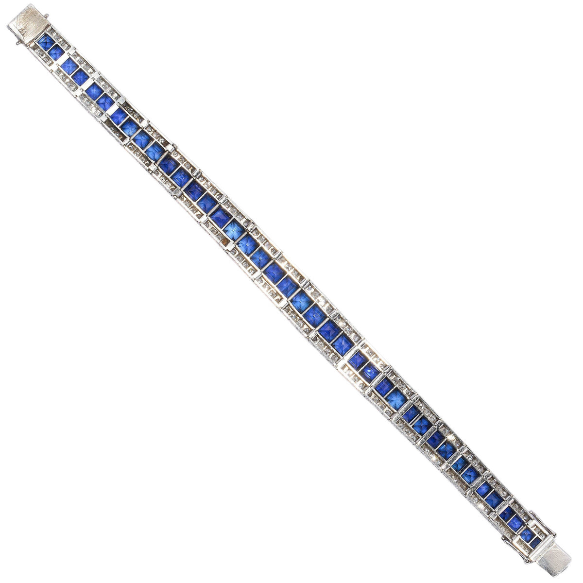 A three row sapphire and diamond graduating bracelet in platinum