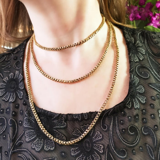 A long fancy link yellow gold chain necklace, modelled