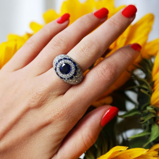 Modern Sapphire Diamond and Platinum Bombé Ring