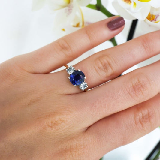Modern Sapphire Diamond and Yellow and White Gold Three Stone Ring, 1.93 Carats
