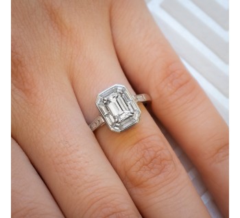 Modern 0.72ct Emerald-Cut Diamond and Platinum Ring
