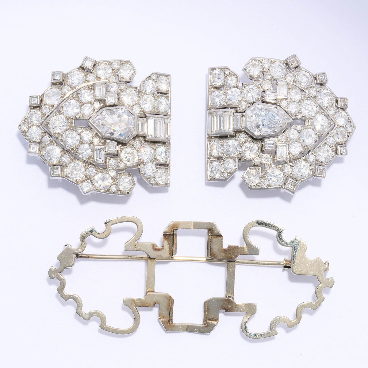 A diamond double clip brooch in platinum and white gold