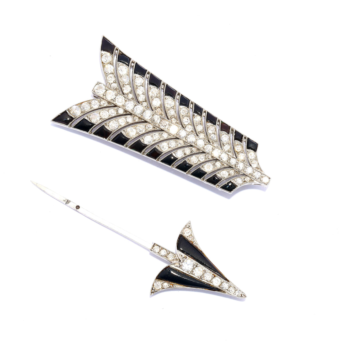 A black onyx and diamond ornate arrow jabot pin brooch, in platinum