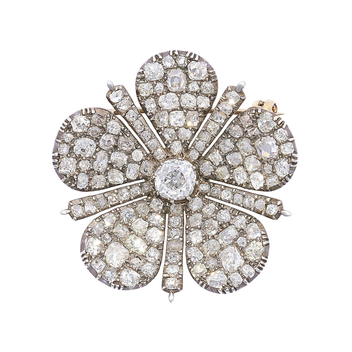 An antique old cut diamond flower brooch in silver and gold