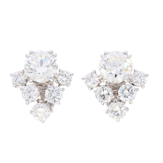 A pair of round diamond V-shaped cluster earrings in platinum 