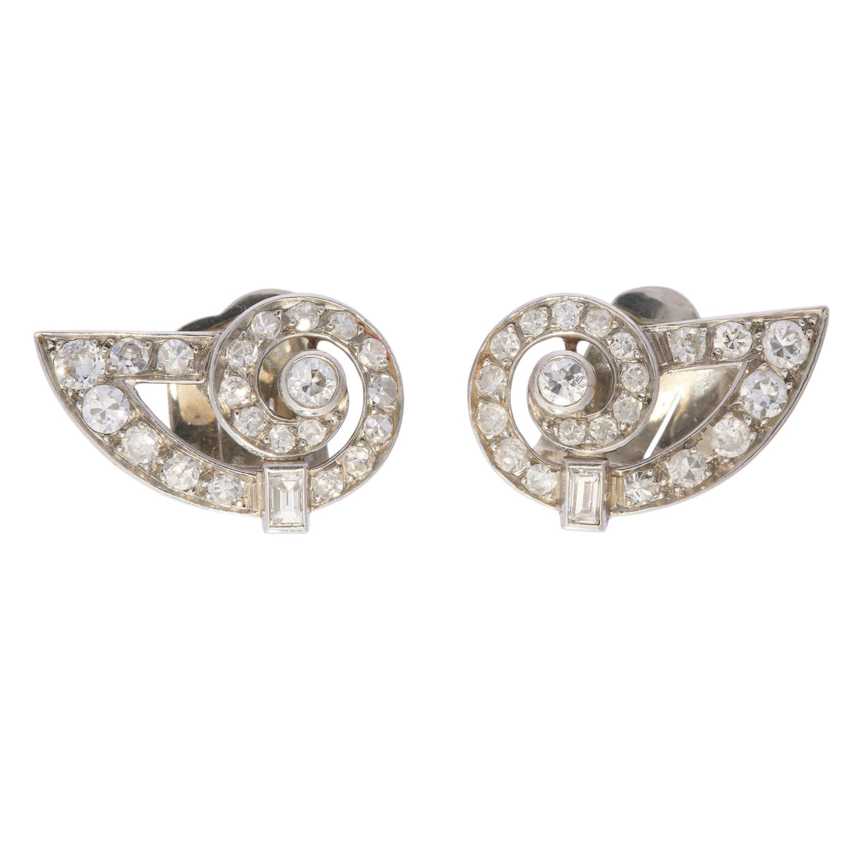 A pair of round diamond shell shaped earrings in platinum