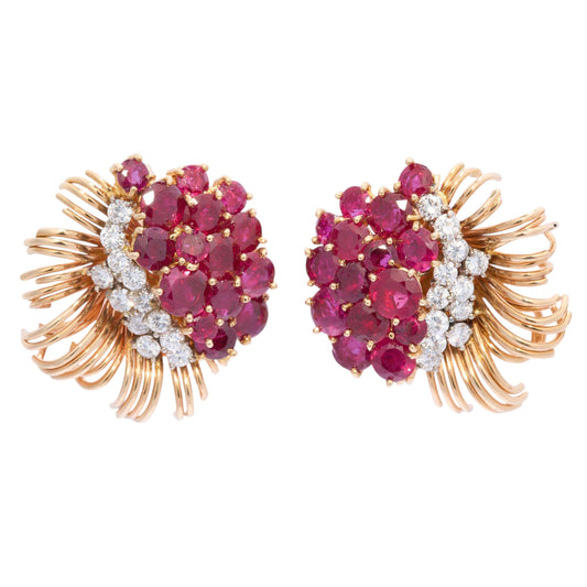 A pair of round ruby and round diamond floral spray earrings in yellow gold