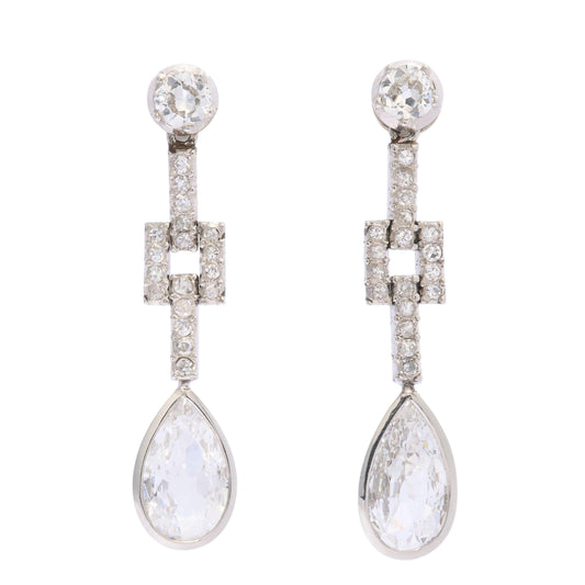 A pair of old cut and pear cut diamond drop earrings in platinum