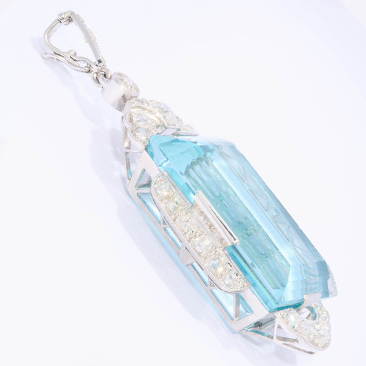 An Art Deco large rectangular aquamarine and diamond pendant in platinum