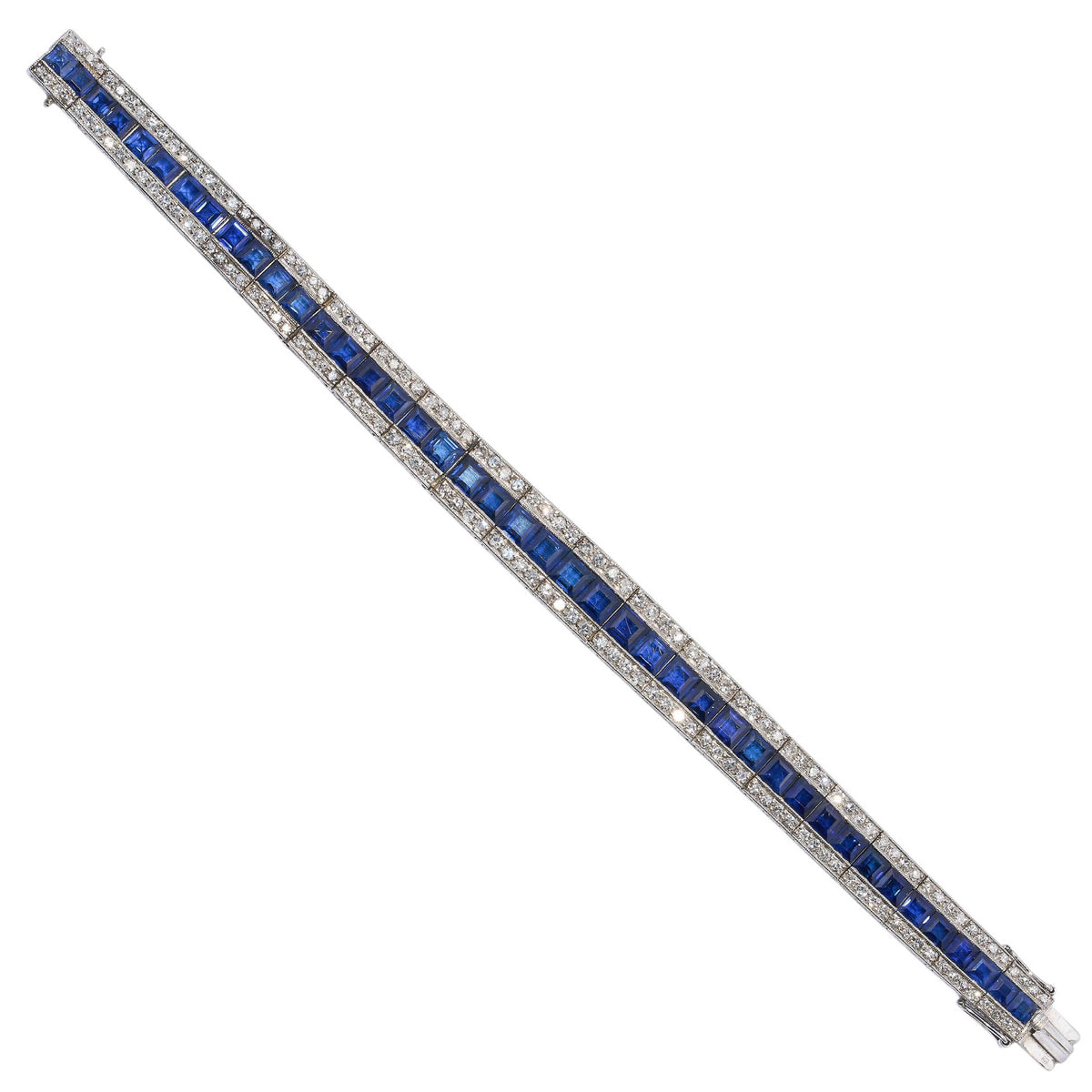 A three row sapphire and diamond graduating bracelet in platinum