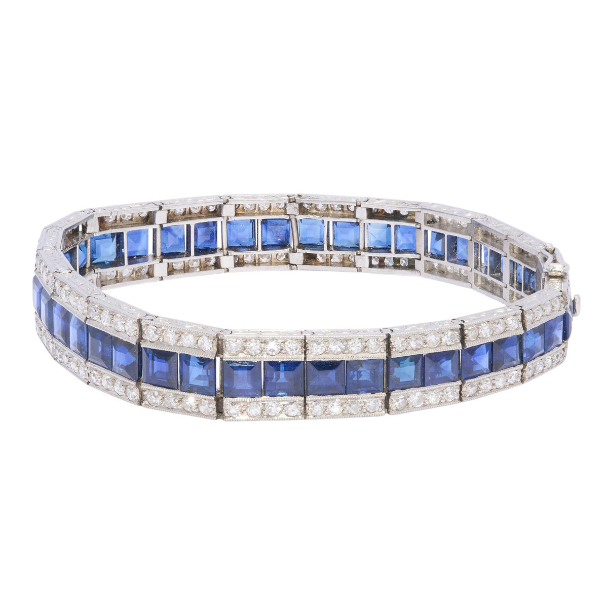 A three row sapphire and diamond graduating bracelet in platinum
