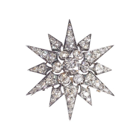 Antique Diamond and Silver Upon Gold Twelve Point Star Brooch, Circa 1880, 11.26 Carats
