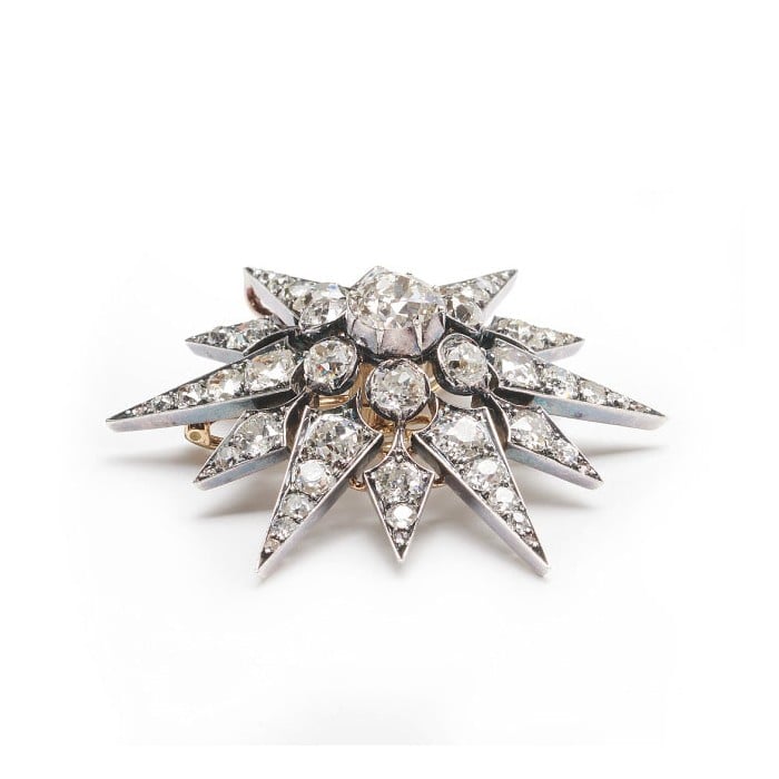 Antique Diamond and Silver Upon Gold Twelve Point Star Brooch, Circa 1880, 11.26 Carats