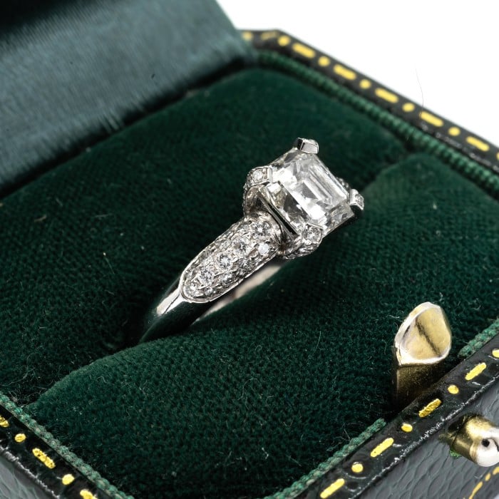 Emerald Cut Diamond and Platinum Ring With Pavé Set Shoulders, 1.23ct