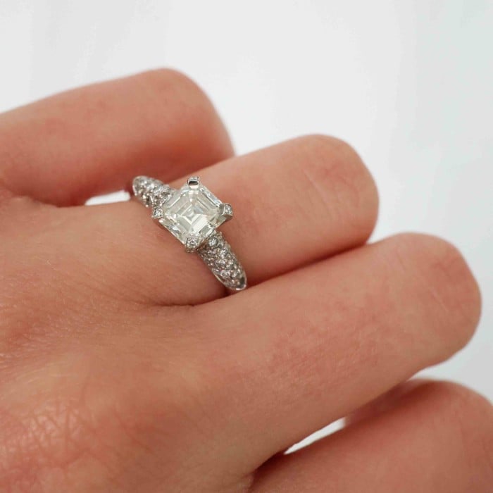 Emerald Cut Diamond and Platinum Ring With Pavé Set Shoulders, 1.23ct