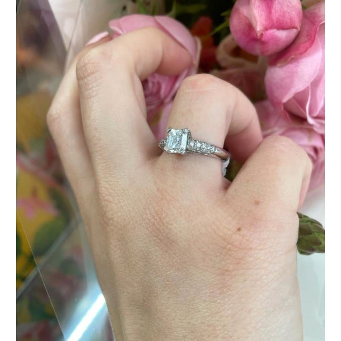 Emerald Cut Diamond and Platinum Ring With Pavé Set Shoulders, 1.23ct