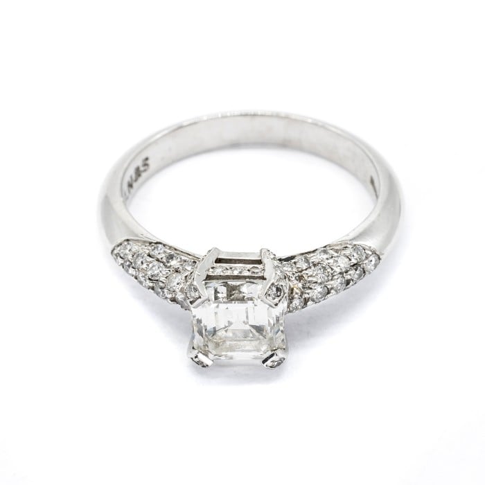 Emerald Cut Diamond and Platinum Ring With Pavé Set Shoulders, 1.23ct
