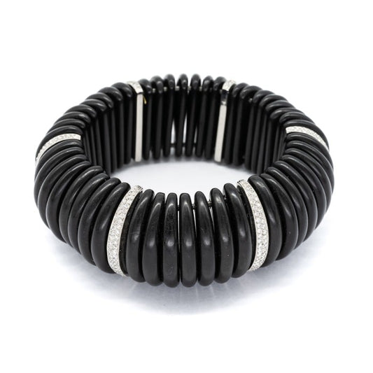 An ebony, diamond and platinum expanding cuff bracelet