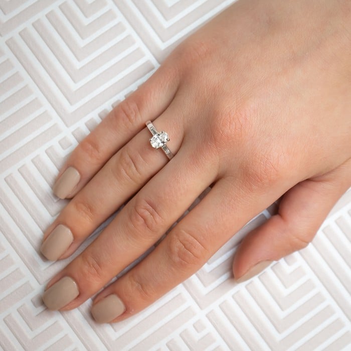 Modern Oval Diamond and Platinum Solitaire Ring 0.91 Carats
