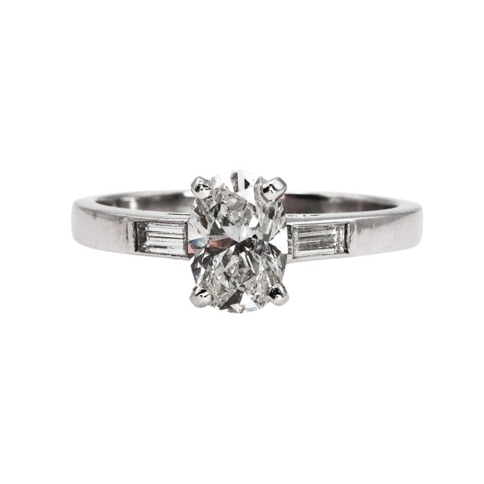 Modern Oval Diamond and Platinum Solitaire Ring 0.91 Carats
