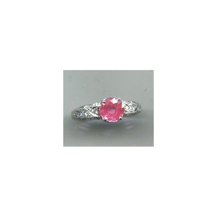 Modern Pink Sapphire, 1.57 Carats Diamond and Platinum Ring, Circa 2009