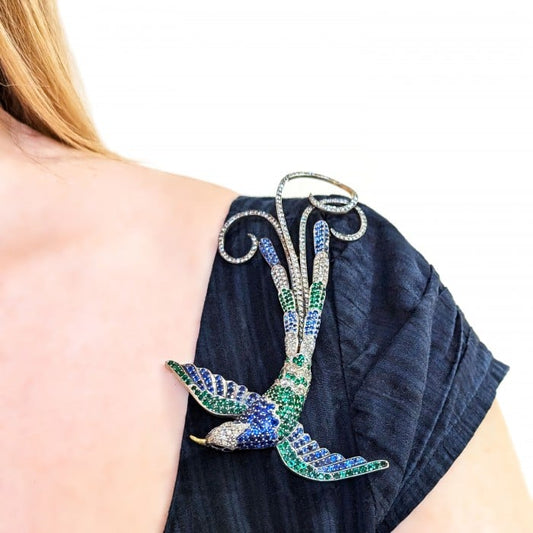 Moira Sapphire, Diamond, Emerald and Silver Upon Gold Bird of Paradise Brooch, Circa 2002