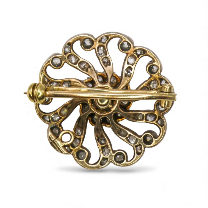 Victorian Diamond and Silver Upon Gold Pinwheel Cluster Brooch, Circa 1890